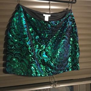 H & M velvet mini skirt with green + purple sequin
